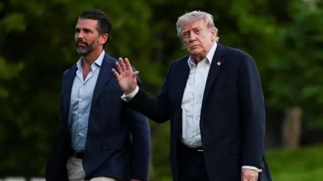 Donald Trump and his son, Donald Jr, in Washington DC last night