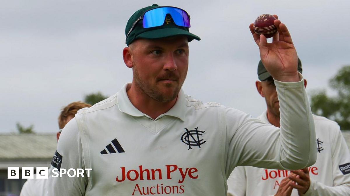 Liam Patterson-White leaves the outfield with the ball after taking five wickets against Leicestershire