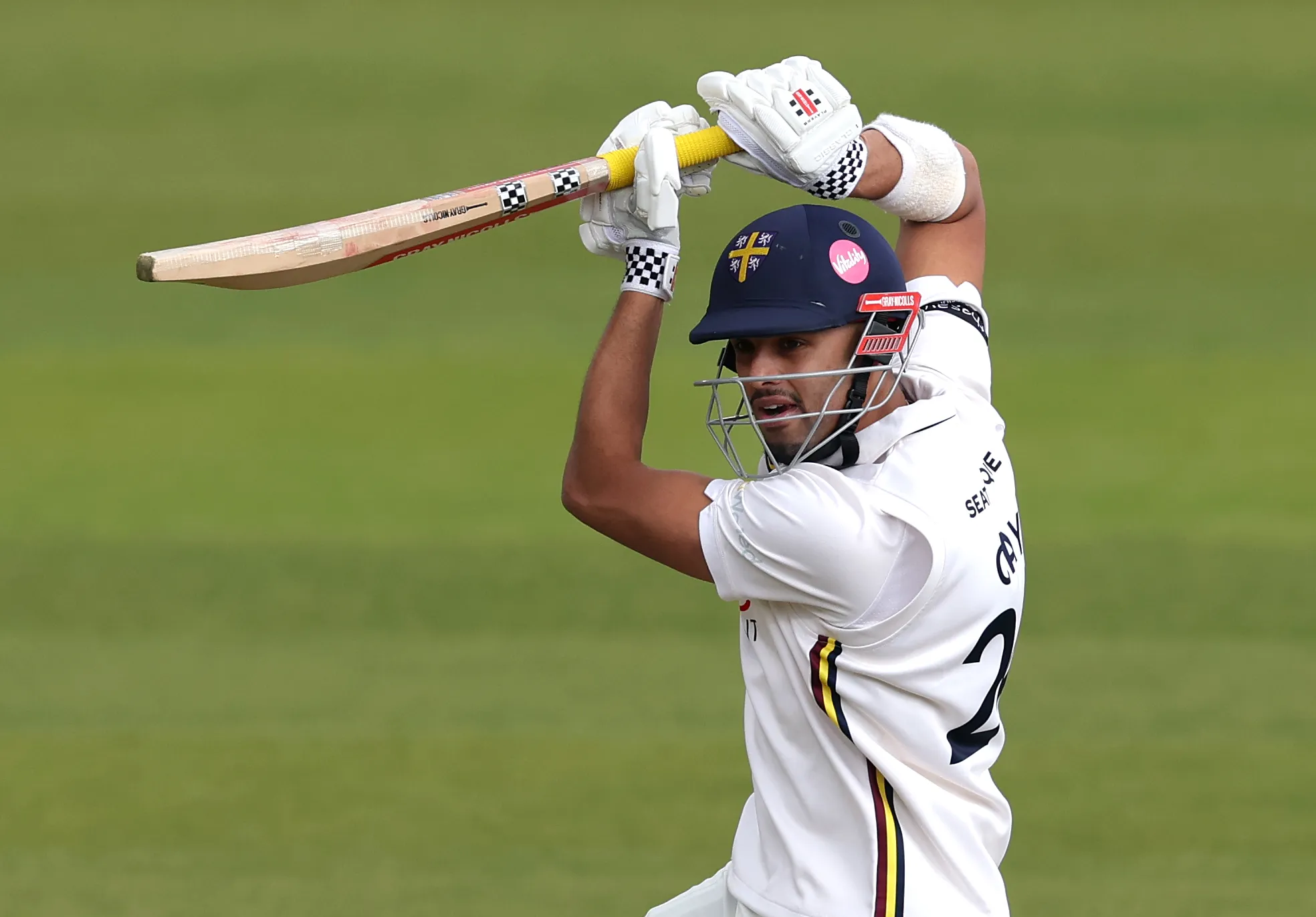 Durham batsman Emilio Gay in batting action.