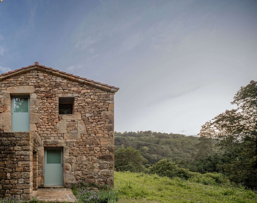 vernacular stone cabin in northern spain gains a renewed layered inner envelope - 1