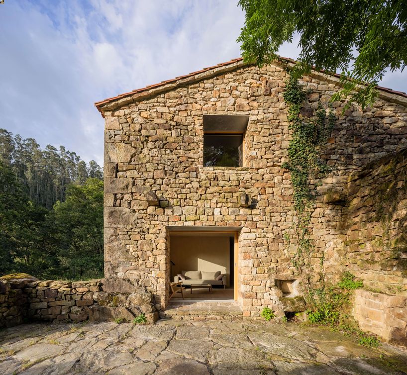 vernacular stone cabin in northern spain gains a renewed layered inner envelope - 2