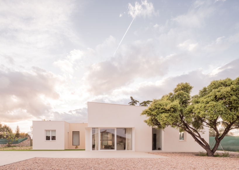 casa violetas balances enclosure and openness through courtyard living in madrid - 1