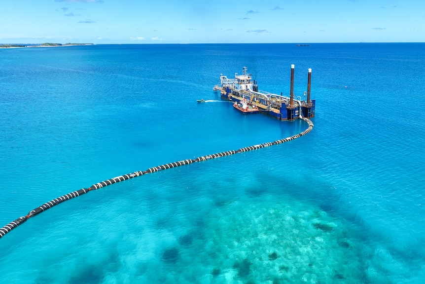 Around the capital Funafuti giant dredging ships vacuum sand from lagoon floors and pump it to elevate Tuvalu's shorelines.