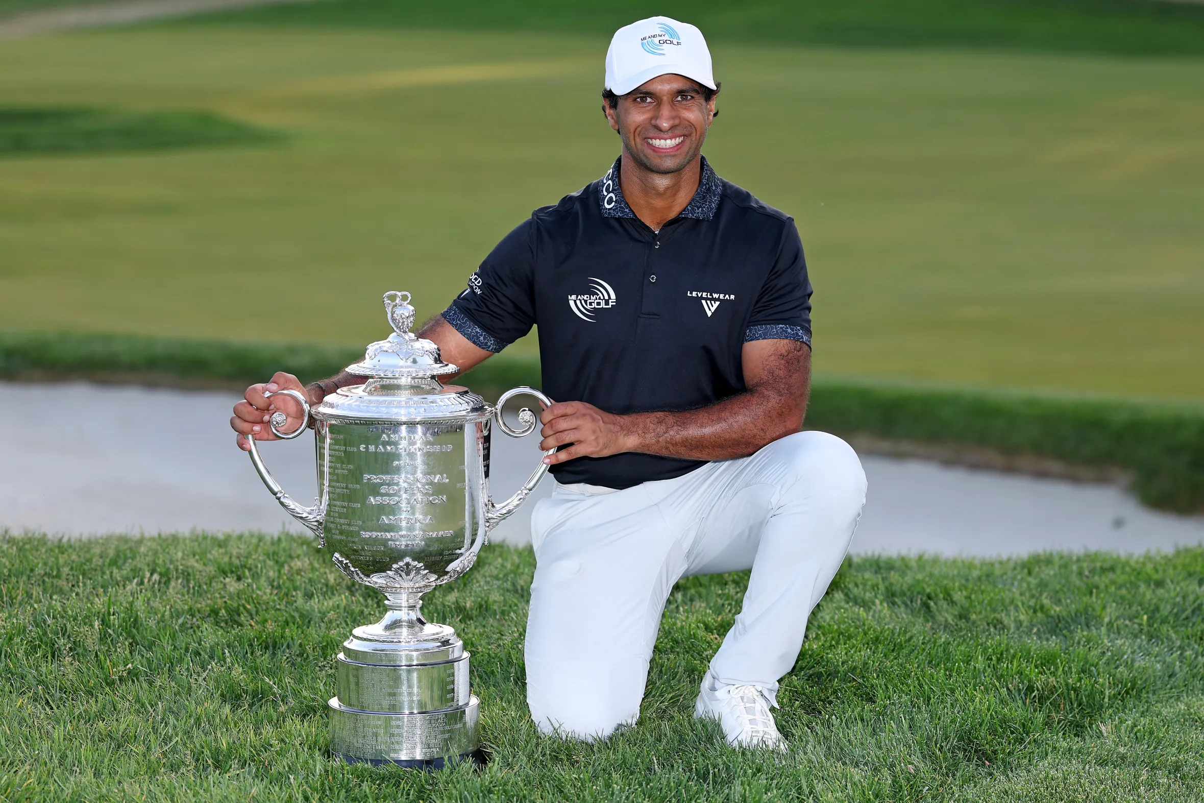 Aaron Rai poses with The Wanamaker Trophy after winning the 2026 PGA Championship.