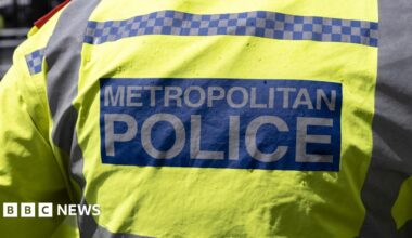 Back of a jacket that reads "Metropolitan Police"