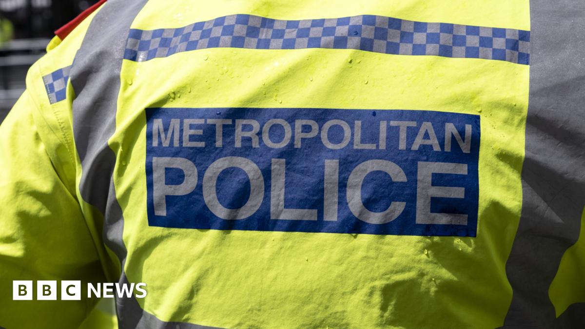Back of a jacket that reads "Metropolitan Police"