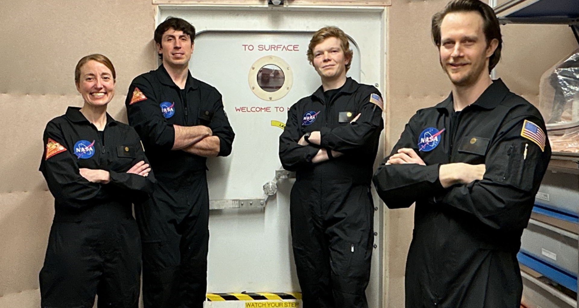 Members of NASA’s CHAPEA (Crew Health and Performance Exploration Analog) mission 2 pose for a group photo. (From left to right: Ellen Ellis, Ross Elder, James Spicer, Matthew Montgomery)