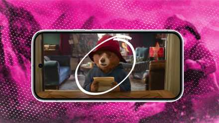 Scribbled circle around Paddington Bear movie scene on phone screen