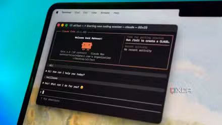 claude ai coding assistant displayed in terminal window on mac laptop