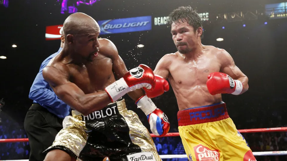 Floyd Mayweather Jr. and Manny Pacquiao boxing.