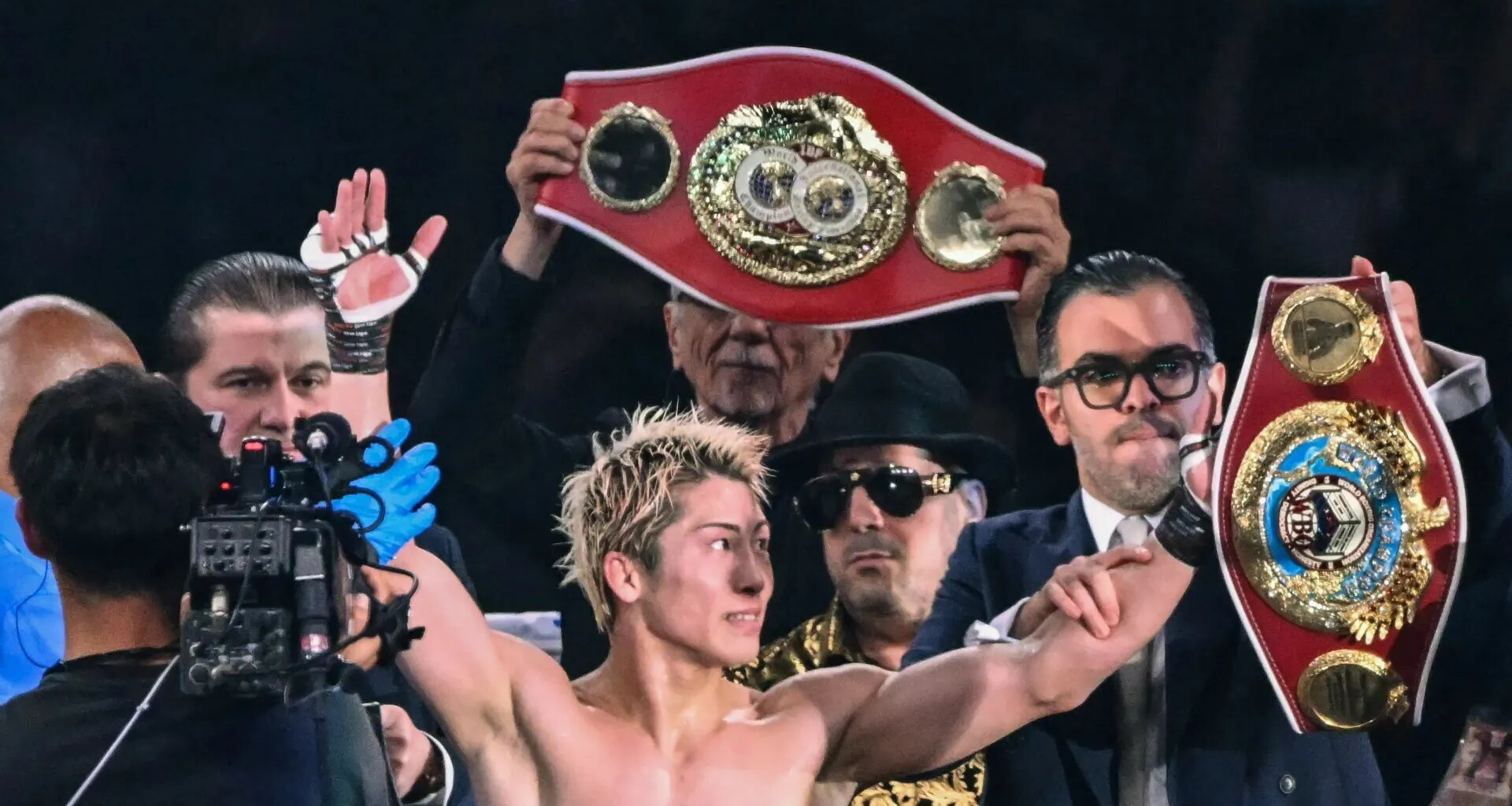 The Monster WINS bloody brawl as cagey title fight goes the distance
