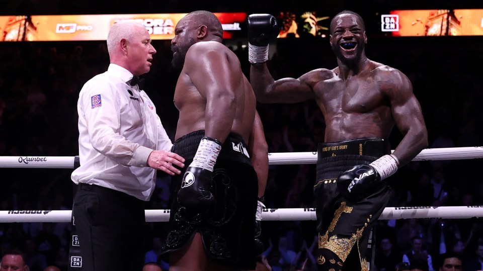 Deontay Wilder and Derek Chisora with referee Mark Bates