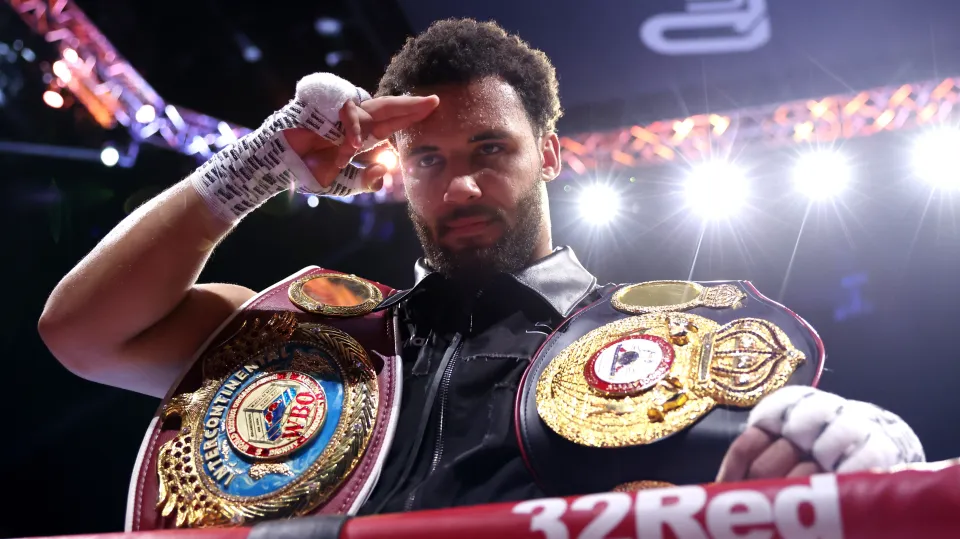 Moses Itauma with his belts after beating Jermaine Franklin