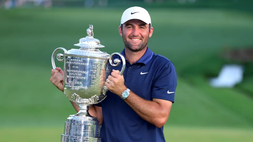 Defending champion Scottie Scheffler holds the Wanamaker Trophy following his victory during the final round of the 2025 PGA Championship