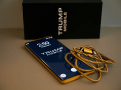 A picture of the Trump Phone T1 alongside the box and cable.