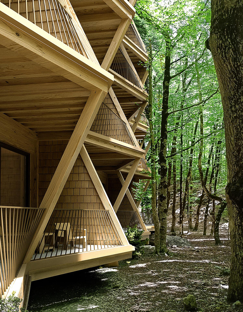 fragmented timber volumes compose forested mountain housing by arup in albania - 8