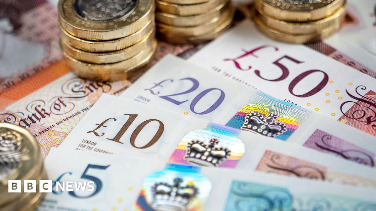 Pound coins and a 5,10,20 and 50 pound note