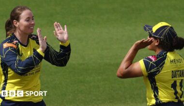 Amanda-Jade Wellington of Hampshire Hawks Women celebrates claiming a wicket with team-mates