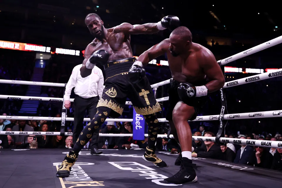 Derek Chisora punches Deontay Wilder during the Heavyweight fight between Derek Chisora and Deontay Wilder as part of the Dereck Chisora v Deontay Wilder: 100 fight night at The O2 Arena on April 04, 2026 in London, England