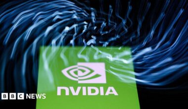 A laptop keyboard and Nvidia logo displayed on a phone screen are seen in this multiple exposure illustration photo