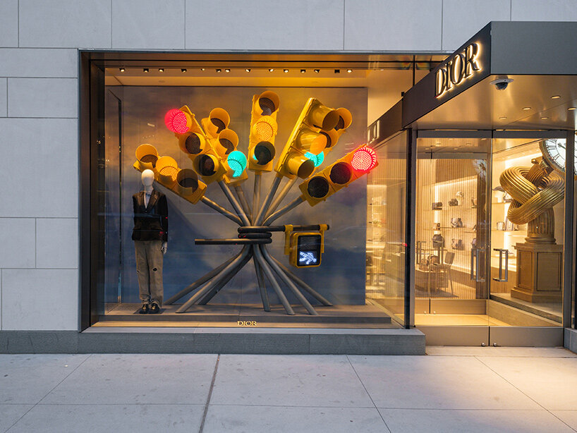alex chinneck twists NYC taxis and LA cars into storefront sculptures for dior - 3