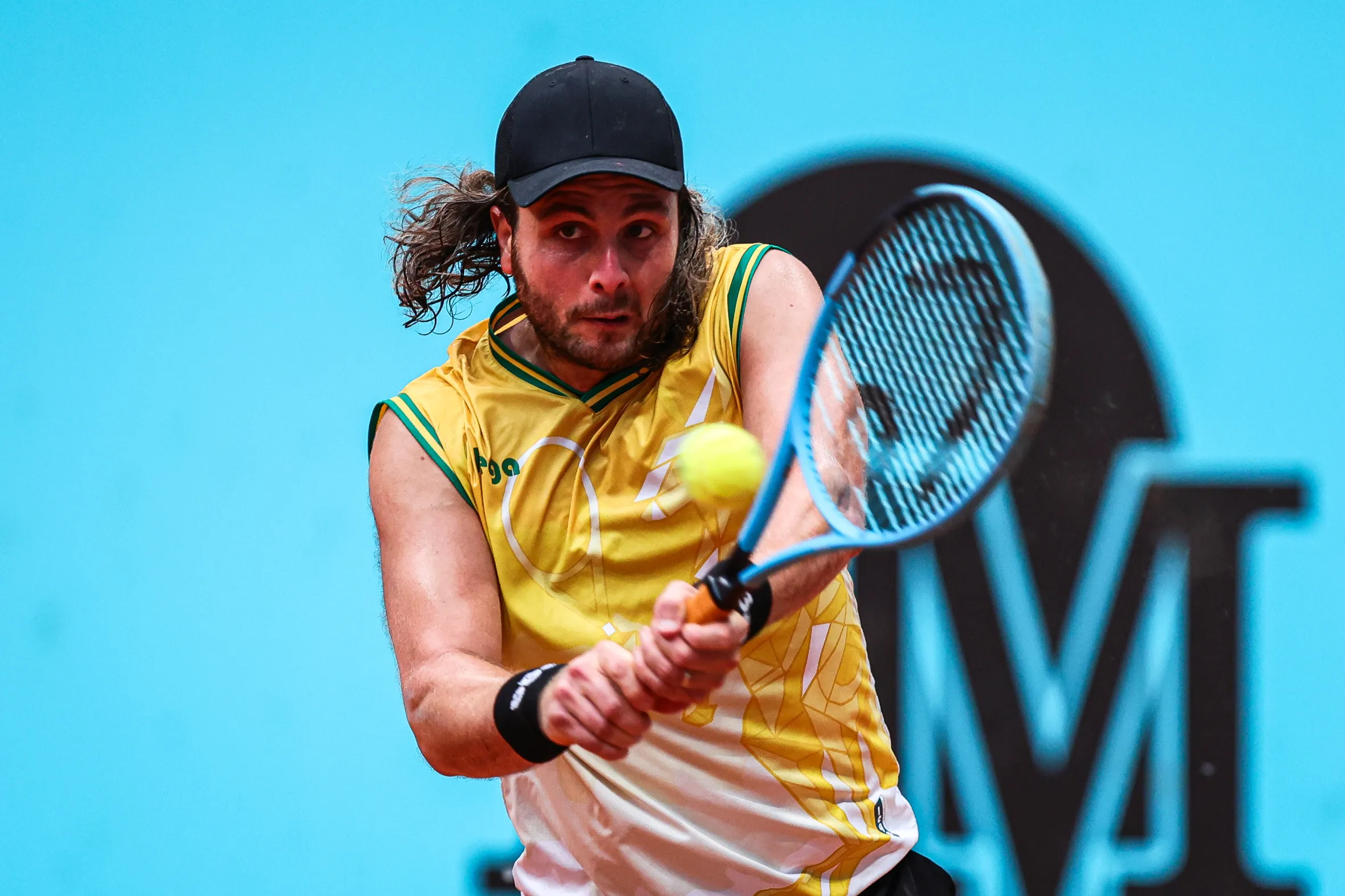 Marco Trungelliti returns a tennis ball during the Mutua Madrid Open.