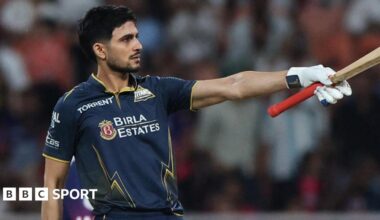 Gujarat Titans' Shubman Gill celebrates after reaching his century
