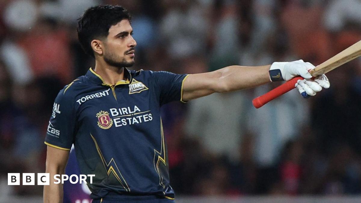 Gujarat Titans' Shubman Gill celebrates after reaching his century