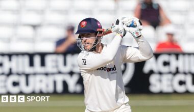 Essex's Simon Harmer drives through the covers for four against Hampshire
