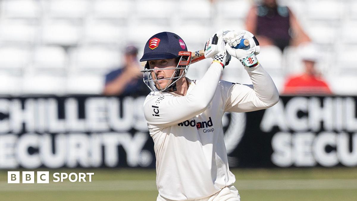 Essex's Simon Harmer drives through the covers for four against Hampshire