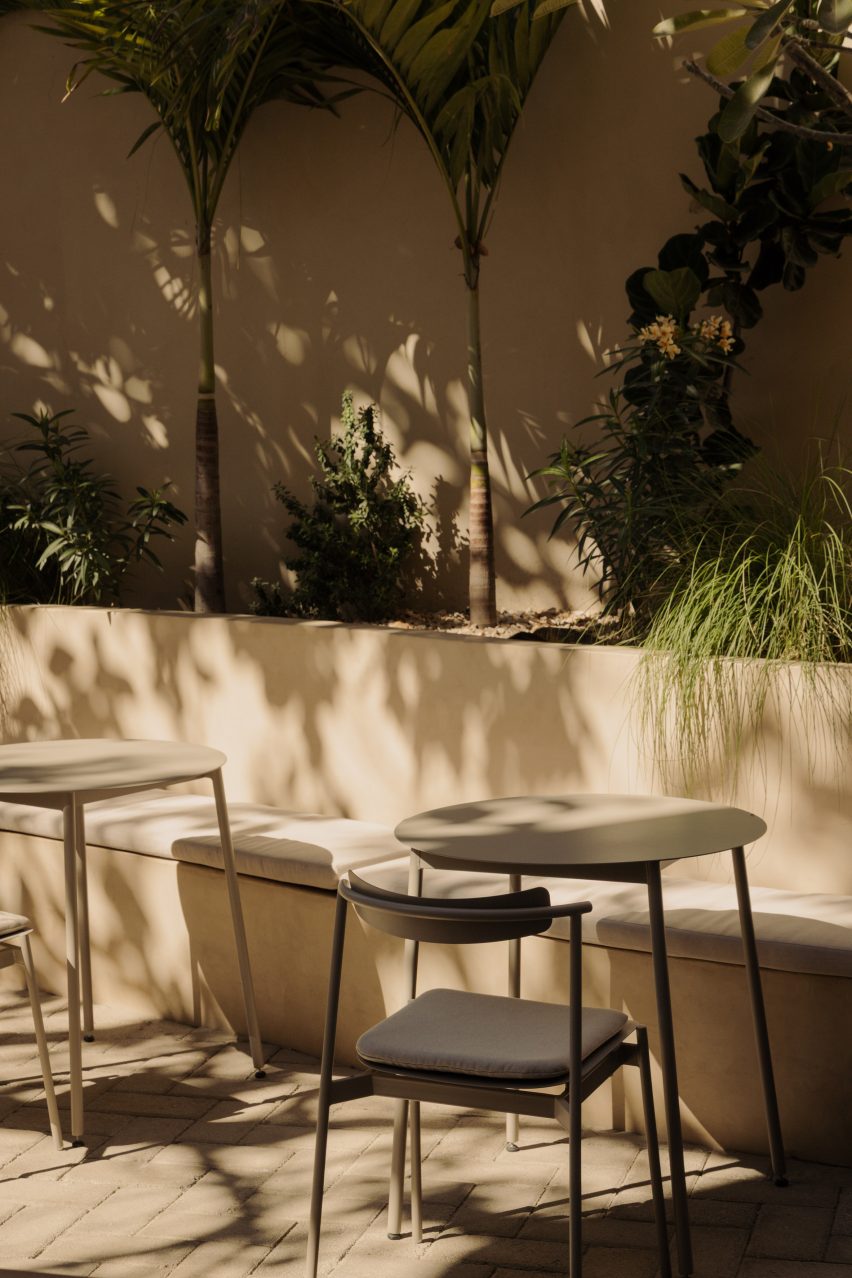 A courtyard provides an outdoor seating area for a cafe