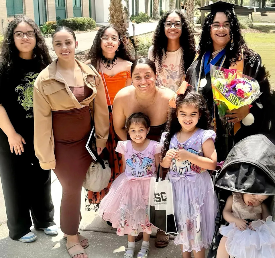 Betsy Rosado family photos - PHOTO: Betsy Rosado of Spring Hill, Florida taking a picture with her family.