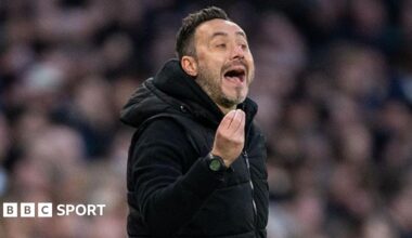 Roberto de Zerbi gesticulates with his hands while on the sidelines as Tottenham boss