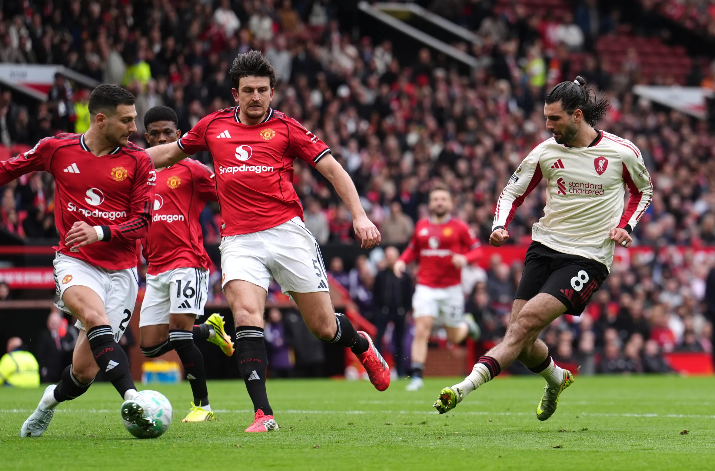 Liverpool's Dominik Szoboszlai scores his side's first goal against Manchester United.