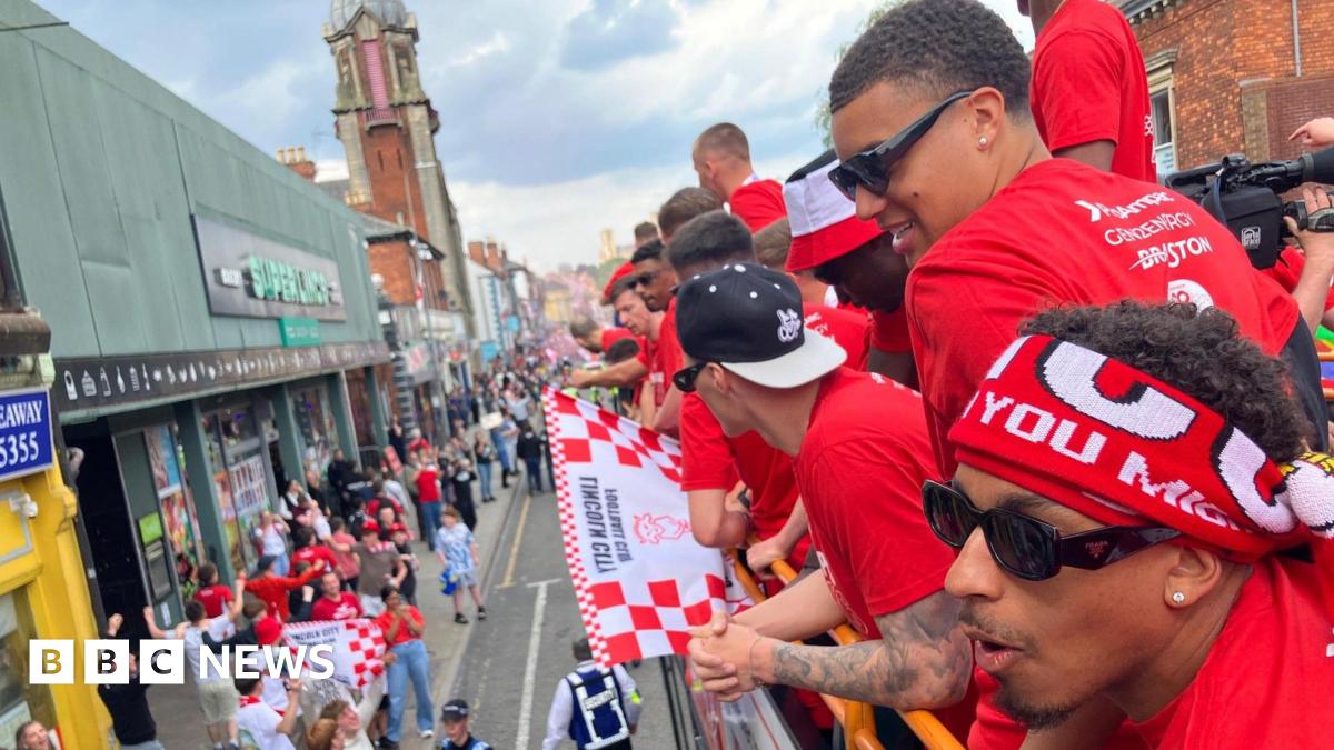 Lincoln City celebrate promotion to Championship with bus parade
