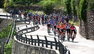 Head-on shot of the peloton snaking through a windy bit of road during a stage of the 2026 Tour of the Alps