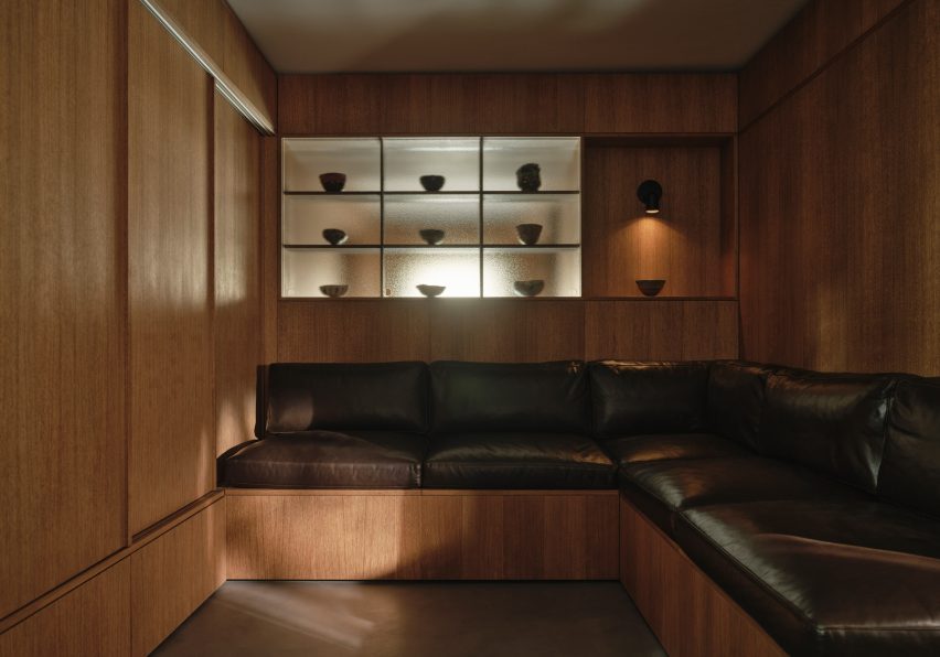 The snug with built-in leather sofas
