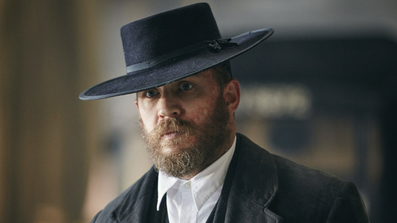 Alfie Solomons wearing a black suit and hat in Peaky Blinders