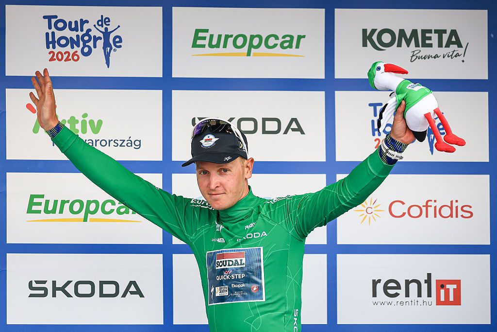 Tim Merlier of Belgium and Team Soudal Quick-Step stands on the podium as the Green Jersey Leader after stage 2 of the 47th Tour of Hungary