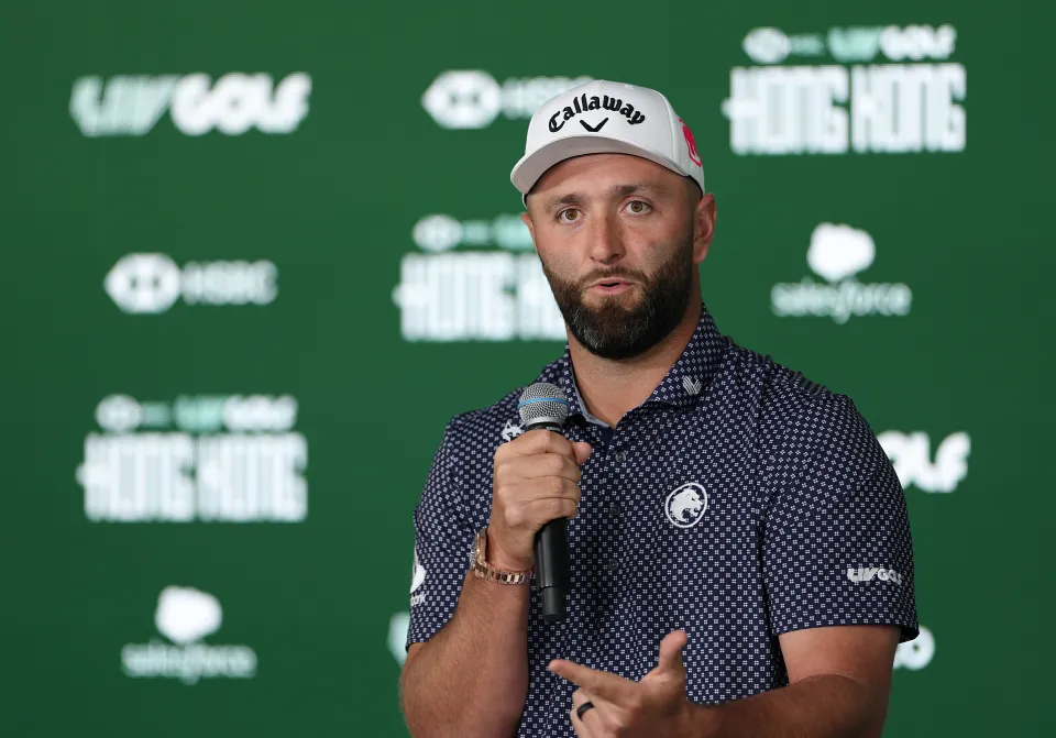 Jon Rahm speaks before a LIV Golf event
