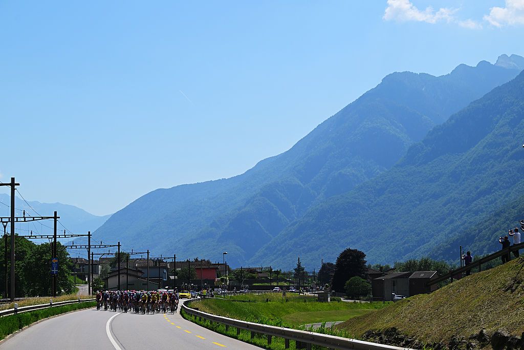 CARI, SWITZERLAND - MAY 26: A general view of the peloton passing through a Osogna village during the 109th Giro d&amp;amp;apos;Italia 2026, Stage 16 a 113km stage from Bellinzona to Cari 1645m / #UCIWT / on May 26, 2026 in Cari, Switzerland. (Photo by Tim de Waele/Getty Images)