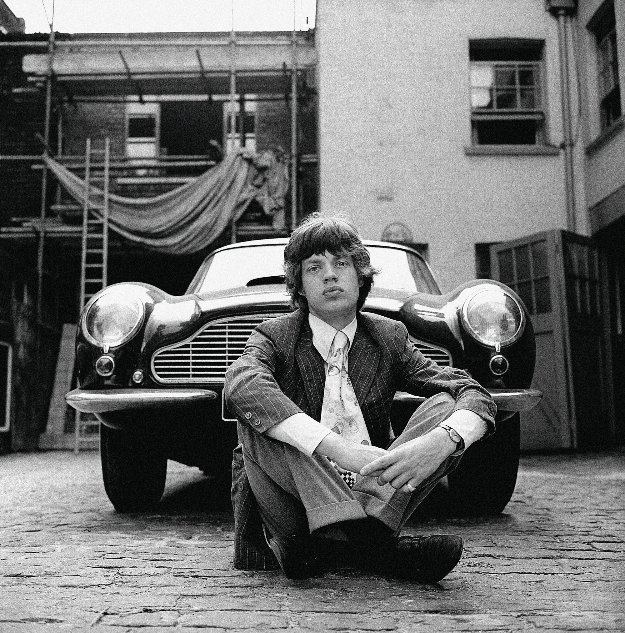 Mick Jagger and his Aston Martin, Bryanston Mews East, 1966