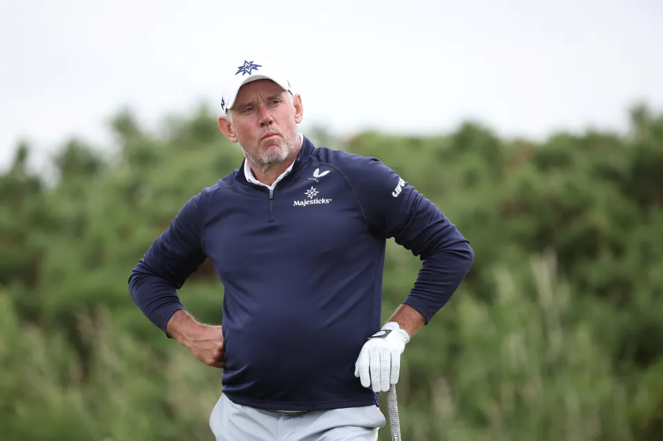 Lee Westwood looking on