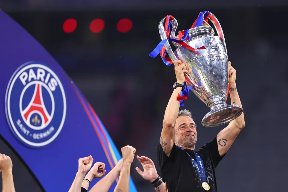 PSG boss Luis Enrique lifts the 2025 Champions League trophy
