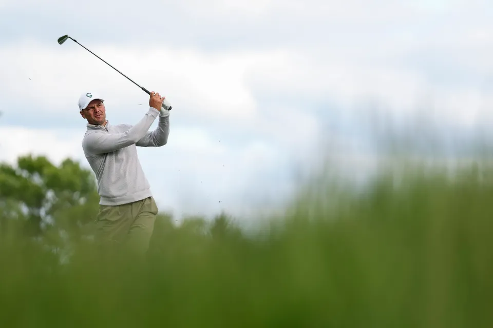 Martin Kaymer of Germany plays his shot from the seventh tee during the first round of the PGA Championship at Aronimink Golf Club on May 14, 2026