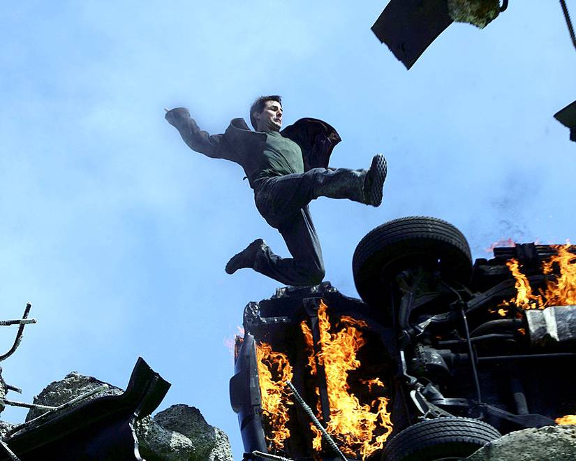 Ethan Hunt jumps over wreckage