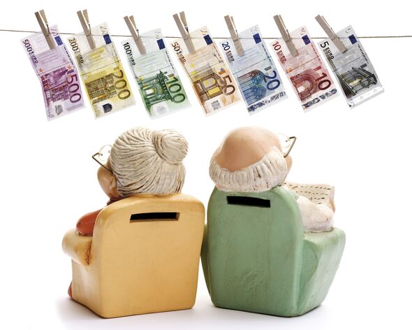 Miniature figures of pensioners, grandma and grandpa in an armchair, looking at euro banknotes hanging from a clothesline Miniature figures of pensioners, grandma and grandpa in an armchair, looking at euro banknotes hanging from a clothesline