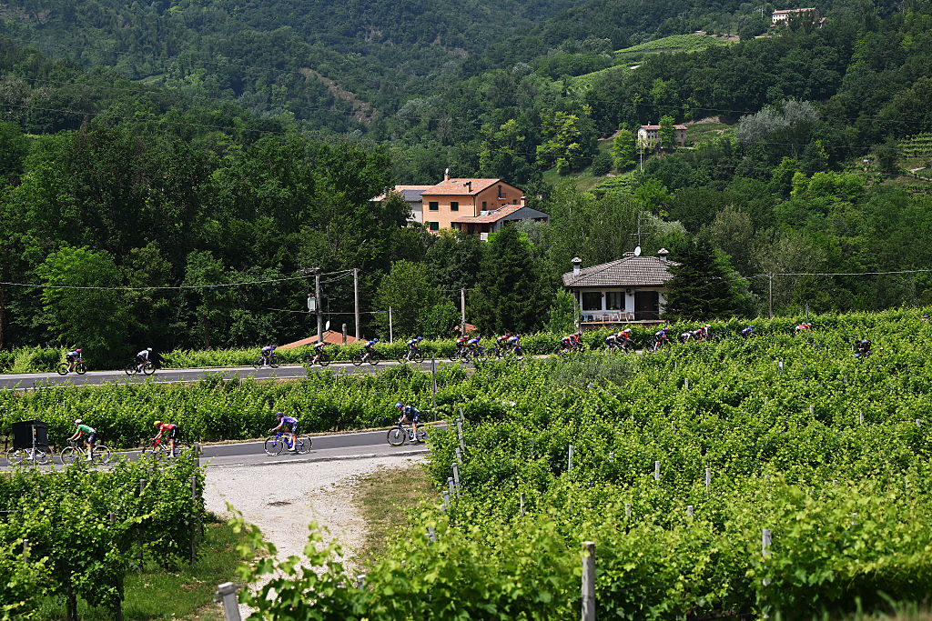 The Giro d'Italia Women peloton passing through vineyards during stage of the 2026 Giro d'Italia Women. (Photo by Luc Claessen/Getty Images)