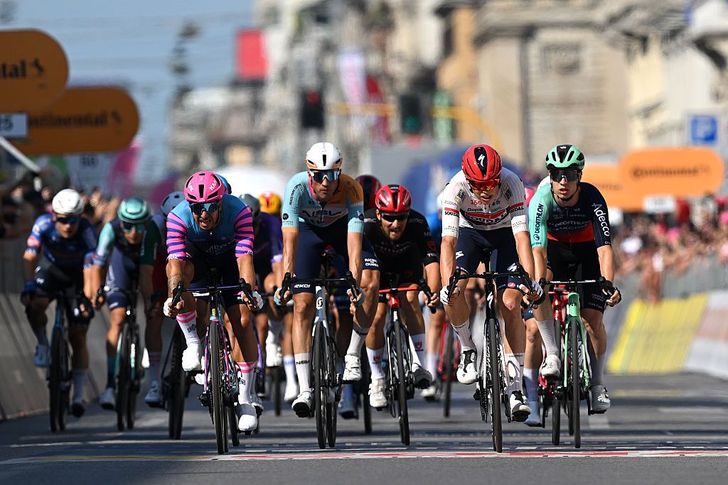 MILAN, ITALY - MAY 24: (L-R) Dylan Groenewegen of Netherlands and Team Unibet Rose Rockets, Ethan Vernon of Great Britain and Team NSN Cycling, Paul Magnier of France and Team Soudal Quick-Step and Tobias Lund Andresen of Denmark and Team Decathlon CMA CGM cross the finish line during the 109th Giro d&amp;apos;Italia 2026, Stage 15 a 157km stage from Voghera to Milan / #UCIWT / on May 24, 2026 in Milan, Italy. (Photo by Tim de Waele/Getty Images)