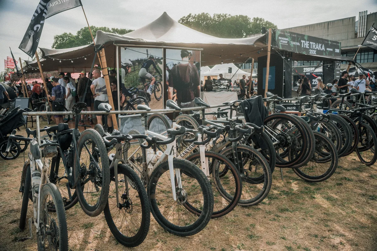 Gravel bikes on a rack at the 2026 Traka
